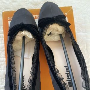 Unlisted brand party shoe. Black matte satin with velvet ribbon detailing.